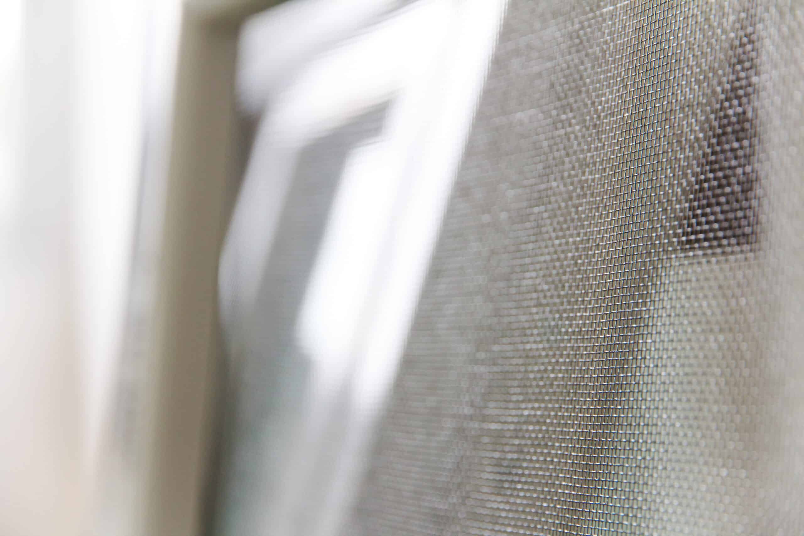 close-up-of-mosquito-net-and-window-background-2023-11-27-05-34-49-utc